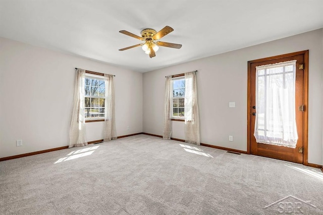 5200 Swede Ave, Midland, MI 48640 - carpeted spare room with a ceiling fan and baseboards