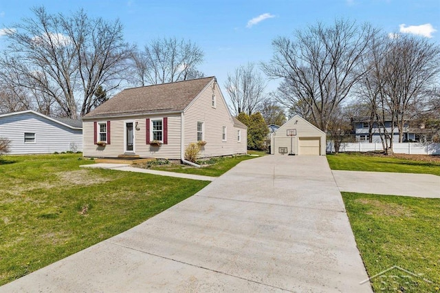 5200 Swede Ave, Midland, MI 48640 - view of front of property featuring a garage, an outbuilding, and a front lawn