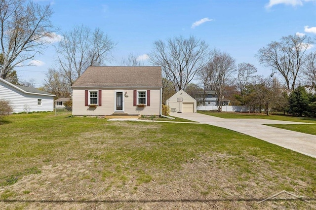 5200 Swede Ave, Midland, MI 48640 - view of front of property with an outdoor structure, a garage, and driveway