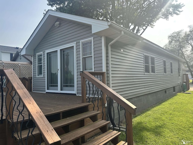 3117 Morin Point St, Erie, MI 48133 - rear view of house featuring a wooden deck and a yard