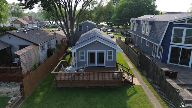 3117 Morin Point St, Erie, MI 48133 - back of house with a deck, a residential view, and a shingled roof