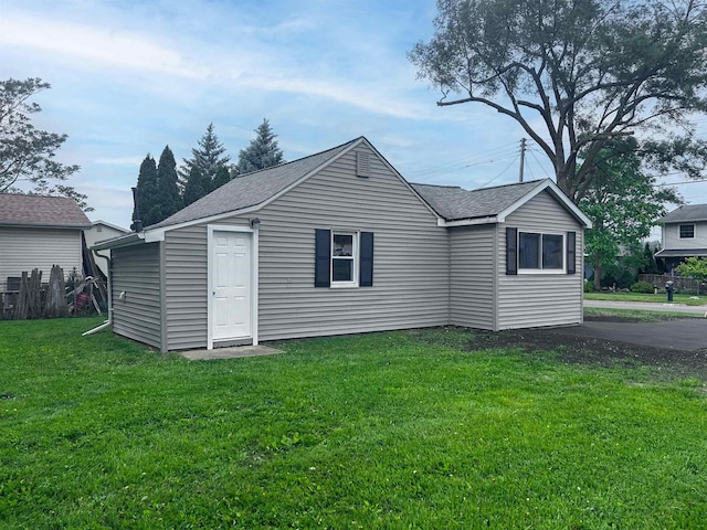 1492 Webber Ave, Burton, MI 48529 - back of property with a shingled roof