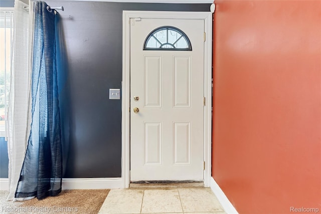 17710 Trinity St, Detroit, MI 48219 - entryway featuring baseboards and light tile patterned flooring