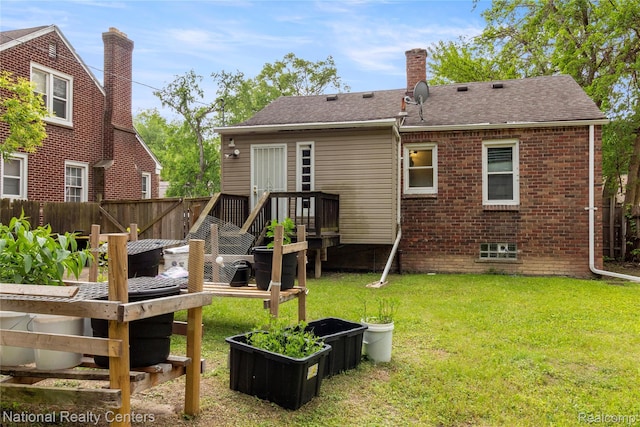 17710 Trinity St, Detroit, MI 48219 - rear view of house with a chimney, a shingled roof, and brick siding