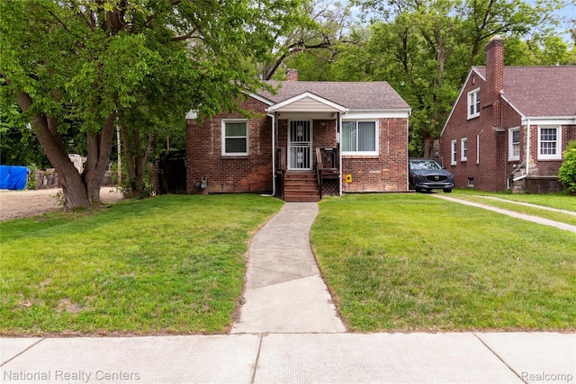 17710 Trinity St, Detroit, MI 48219 - bungalow-style home featuring brick siding, a front lawn, and a chimney