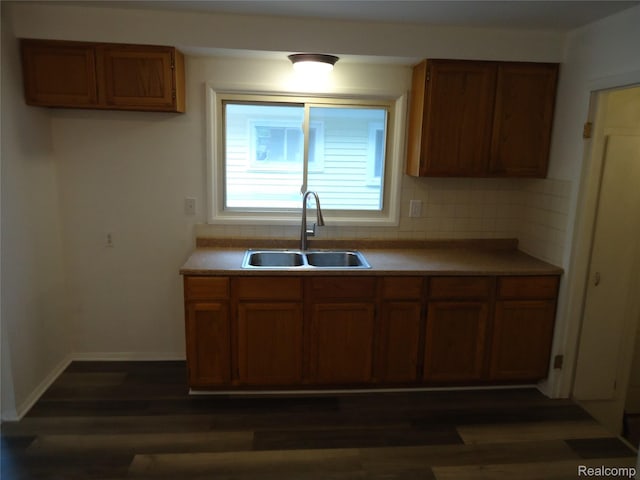 220 W Yale Ave, Pontiac, MI 48340 - kitchen featuring a sink, brown cabinets, and dark wood finished floors