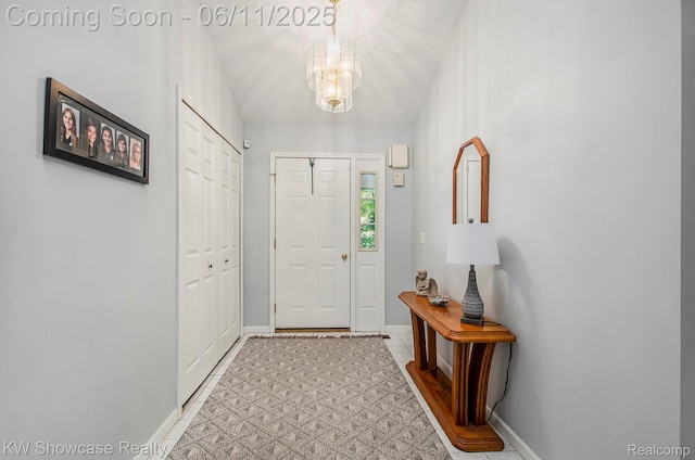 3675 S Commerce Rd, Commerce Twp, MI 48390 - foyer entrance featuring a chandelier and baseboards