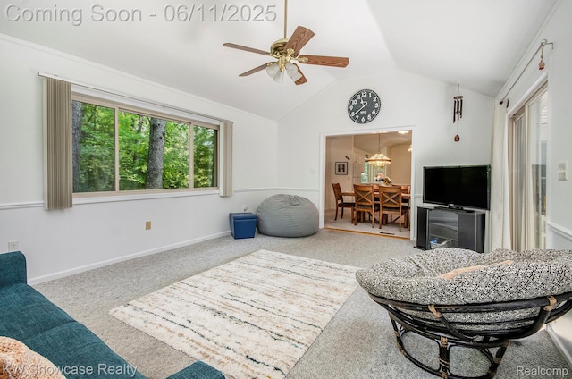 3675 S Commerce Rd, Commerce Twp, MI 48390 - living room featuring healthy amount of natural light, a ceiling fan, vaulted ceiling, and carpet