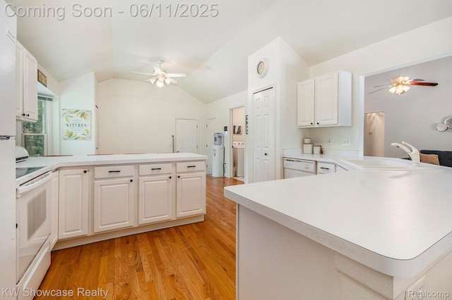3675 S Commerce Rd, Commerce Twp, MI 48390 - kitchen featuring ceiling fan, a peninsula, white appliances, a sink, and light wood-type flooring