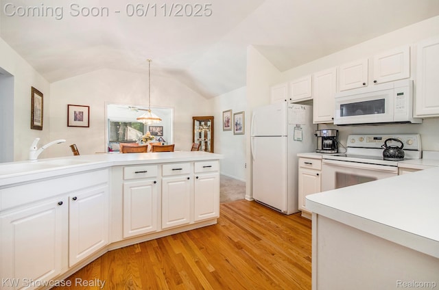 3675 S Commerce Rd, Commerce Twp, MI 48390 - kitchen with white appliances, a sink, light wood-type flooring, light countertops, and white cabinetry