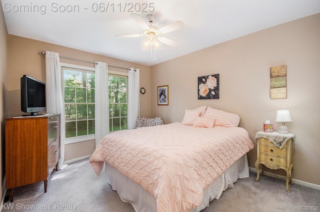 3675 S Commerce Rd, Commerce Twp, MI 48390 - bedroom with light colored carpet, baseboards, and ceiling fan