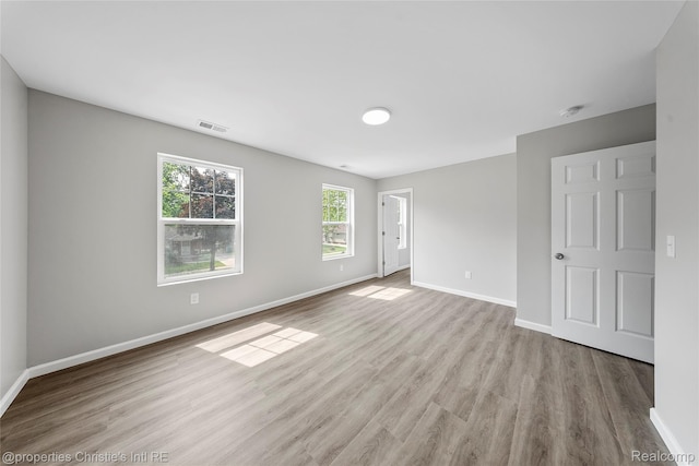 22114 Pleasant Ave, Eastpointe, MI 48021 - unfurnished bedroom with wood finished floors and baseboards