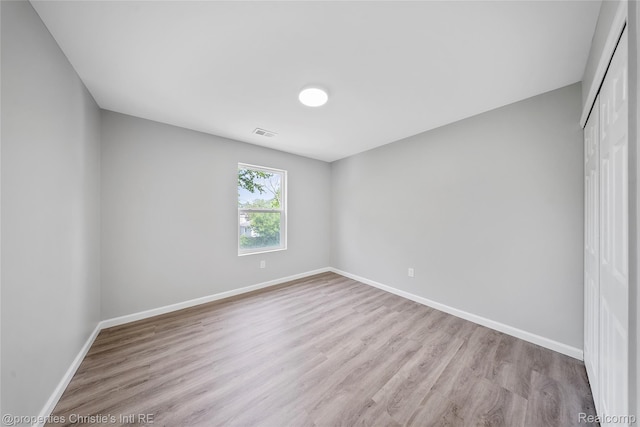 22114 Pleasant Ave, Eastpointe, MI 48021 - empty room with wood finished floors and baseboards