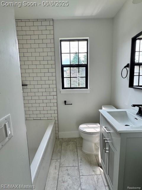 17772 Clark St, Riverview, MI 48193 - full bathroom with vanity, toilet, and baseboards