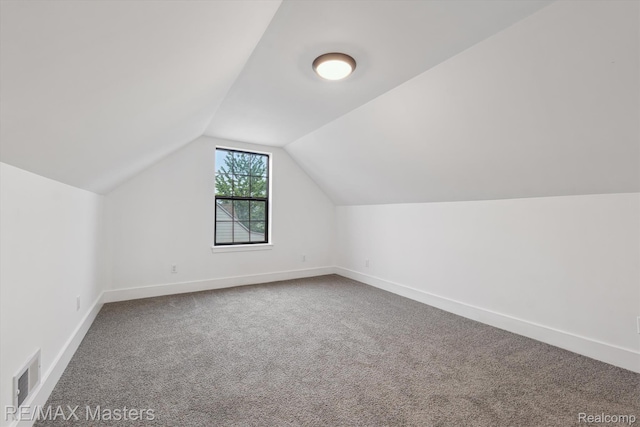 17772 Clark St, Riverview, MI 48193 - bonus room featuring carpet floors, lofted ceiling, and baseboards