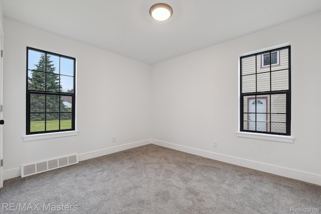 17772 Clark St, Riverview, MI 48193 - spare room featuring carpet flooring and baseboards