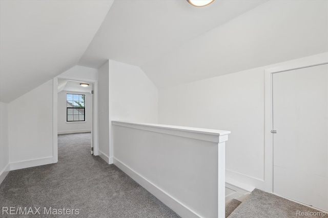 17772 Clark St, Riverview, MI 48193 - additional living space with carpet floors, vaulted ceiling, and baseboards