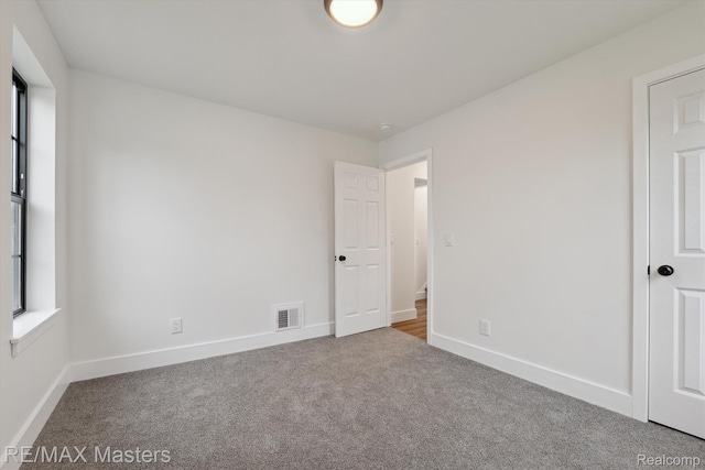 17772 Clark St, Riverview, MI 48193 - spare room featuring carpet and baseboards