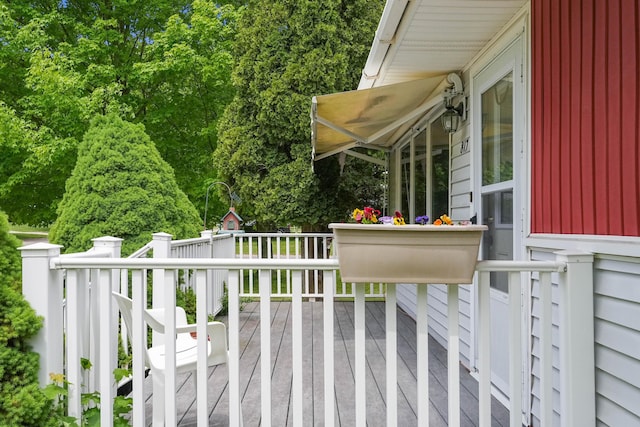 817 Cherry Ave, Big Rapids, MI 49307 - deck featuring view of scattered trees