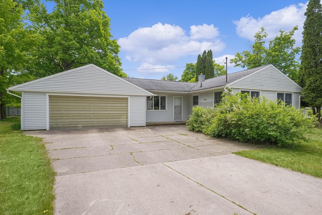 817 Cherry Ave, Big Rapids, MI 49307 - ranch-style house with an attached garage