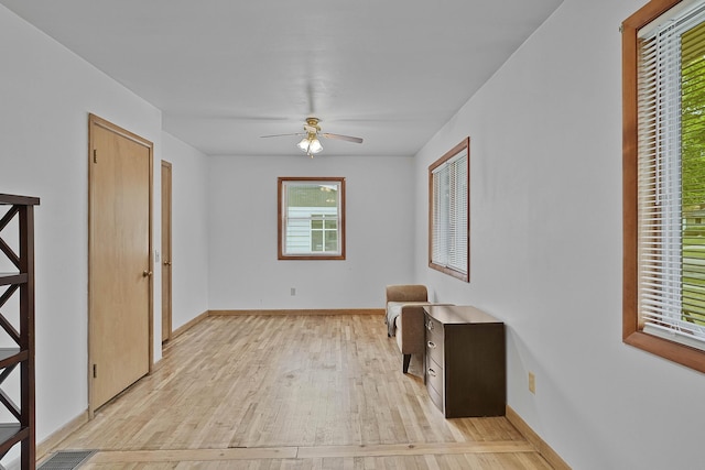 817 Cherry Ave, Big Rapids, MI 49307 - unfurnished room featuring light wood-style floors, ceiling fan, and baseboards