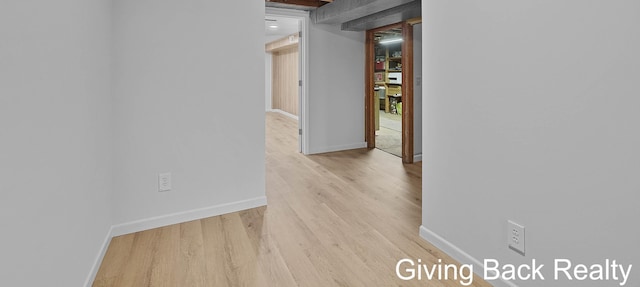 817 Cherry Ave, Big Rapids, MI 49307 - hall featuring wood finished floors and baseboards