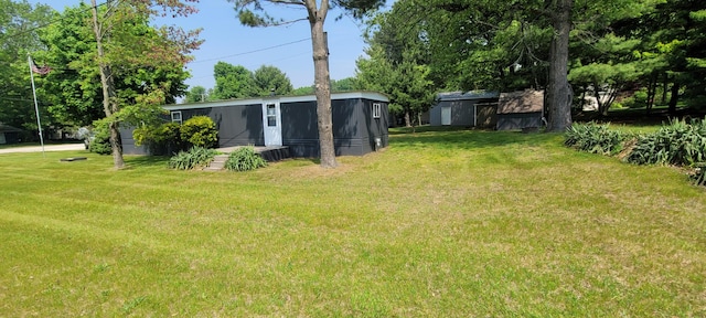 728 Crystal Ln, Mears, MI 49436 - view of green lawn