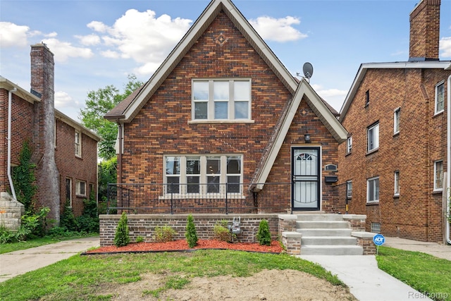 4835 Bedford St, Detroit, MI 48224 - tudor-style house featuring brick siding