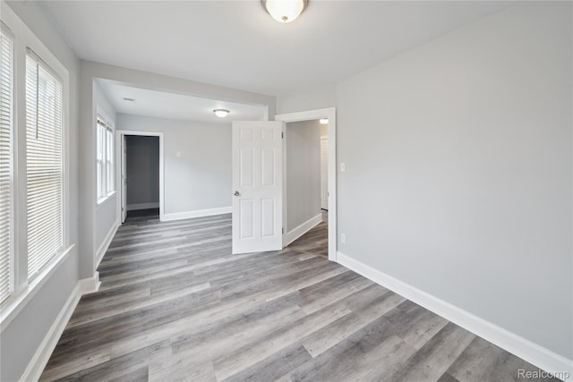 4835 Bedford St, Detroit, MI 48224 - unfurnished room with wood finished floors and baseboards