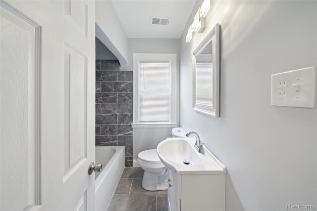 4835 Bedford St, Detroit, MI 48224 - full bath with vanity, toilet, tile patterned floors, and tub / shower combination