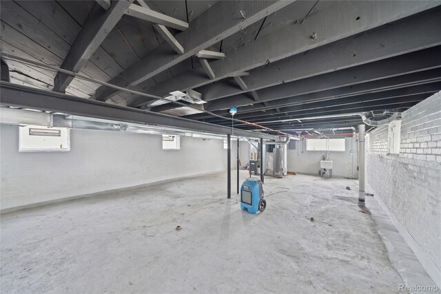 4835 Bedford St, Detroit, MI 48224 - basement with a sink and brick wall