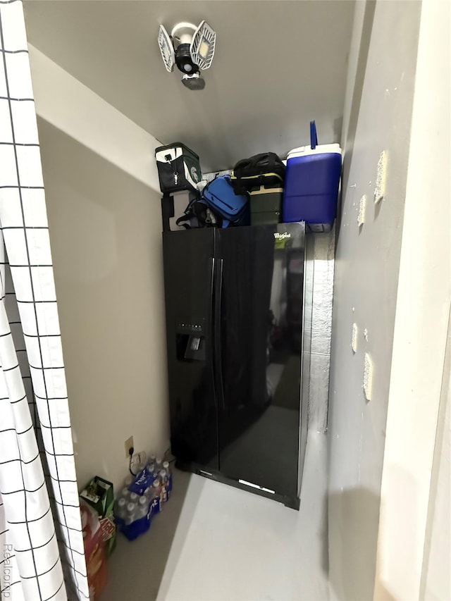 3454 Pine St, Hale, MI 48739 - detailed view of black fridge with ice dispenser