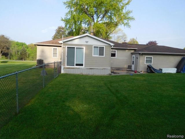 3454 Pine St, Hale, MI 48739 - rear view of house featuring central AC