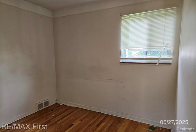 7210 Weingartz, Center Line, MI 48015 - spare room with wood finished floors and baseboards