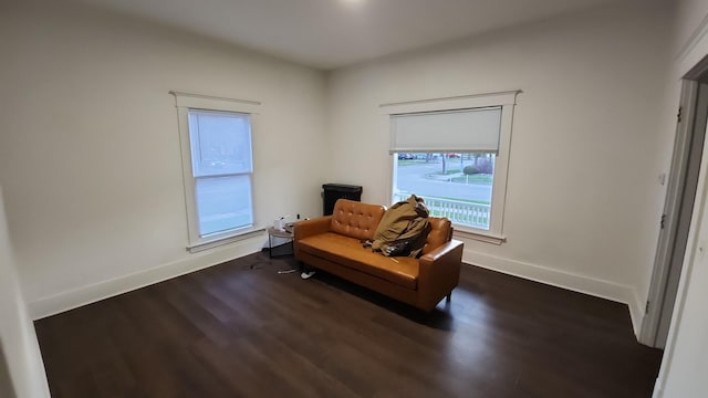 320 W Vine St, Kalamazoo, MI 49001 - sitting room with wood finished floors and baseboards