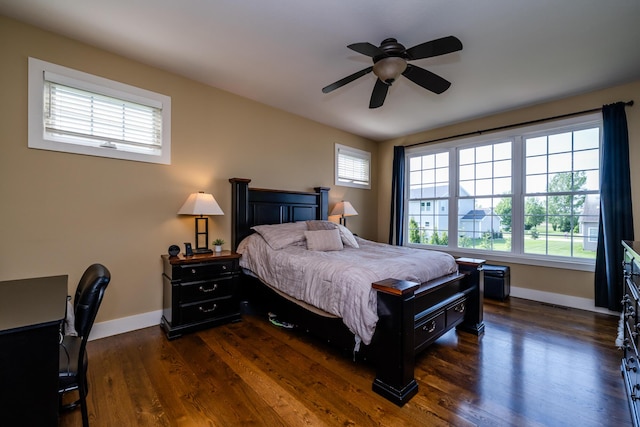 1640 Prairie Dr, Saint Joseph, MI 49085 - bedroom with multiple windows, baseboards, and dark wood-style floors