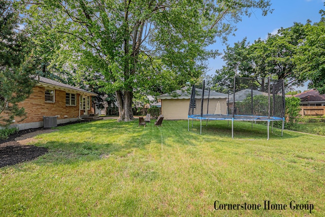2308 Godwin Ave SE, Grand Rapids, MI 49507 - view of yard with a trampoline and central air condition unit