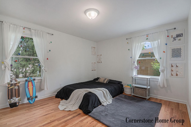2308 Godwin Ave SE, Grand Rapids, MI 49507 - bedroom featuring wood finished floors and baseboards