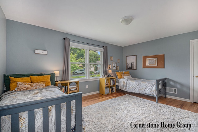 2308 Godwin Ave SE, Grand Rapids, MI 49507 - bedroom with wood finished floors and baseboards