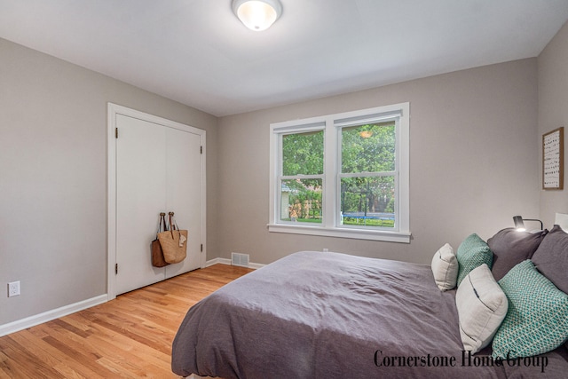 2308 Godwin Ave SE, Grand Rapids, MI 49507 - bedroom featuring wood finished floors and baseboards