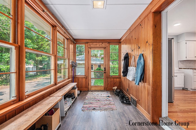 2308 Godwin Ave SE, Grand Rapids, MI 49507 - mudroom featuring wood finished floors and wooden walls