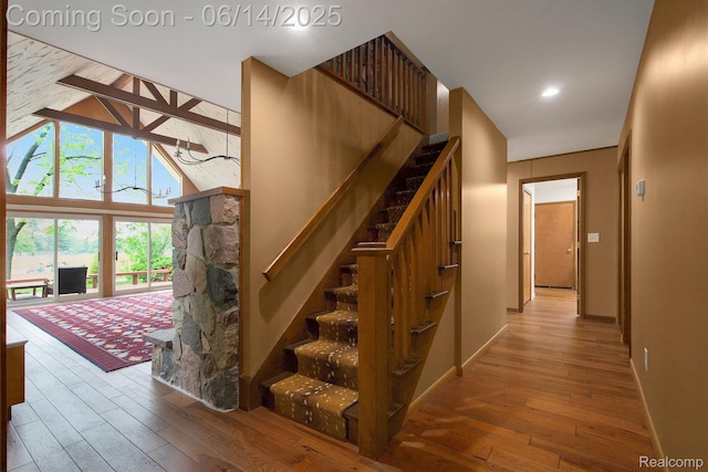9818 Burning Tree Dr, Grand Blanc, MI 48439 - stairs with wood-type flooring, baseboards, and recessed lighting