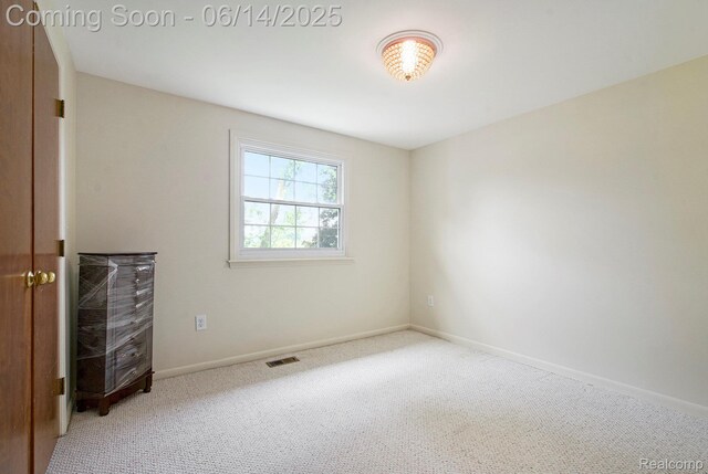 9818 Burning Tree Dr, Grand Blanc, MI 48439 - unfurnished bedroom with carpet flooring and baseboards