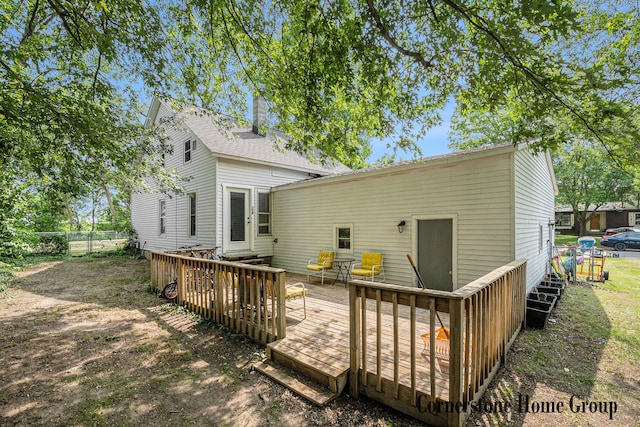 503 E Main St, Middleville, MI 49333 - rear view of house featuring a wooden deck and entry steps