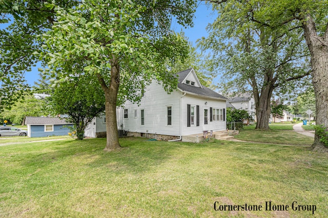 503 E Main St, Middleville, MI 49333 - view of side of home featuring a lawn