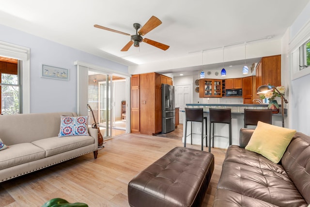 1308 Linwood Ave, Ann Arbor, MI 48103 - living room featuring ceiling fan and light wood finished floors