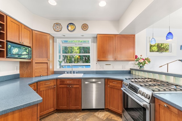 1308 Linwood Ave, Ann Arbor, MI 48103 - kitchen featuring stainless steel appliances, a sink, open shelves, brown cabinets, and recessed lighting
