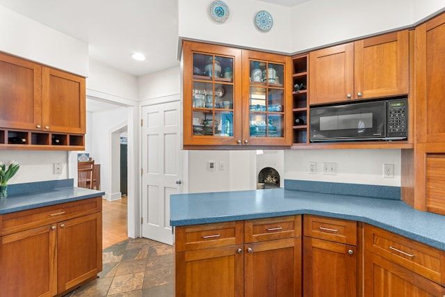 1308 Linwood Ave, Ann Arbor, MI 48103 - kitchen with black microwave, open shelves, brown cabinets, and recessed lighting