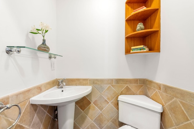 1308 Linwood Ave, Ann Arbor, MI 48103 - half bath with toilet, tile walls, and a wainscoted wall