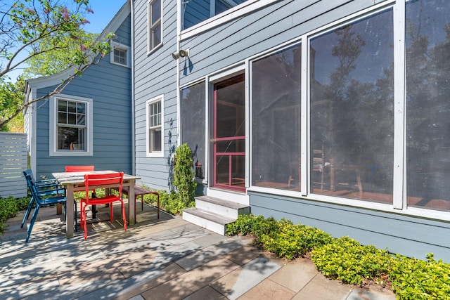 1308 Linwood Ave, Ann Arbor, MI 48103 - view of patio featuring outdoor dining space and entry steps